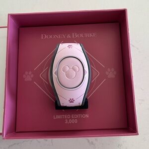 Limited edition Dooney & Bourke dog themed magic band. New in box.